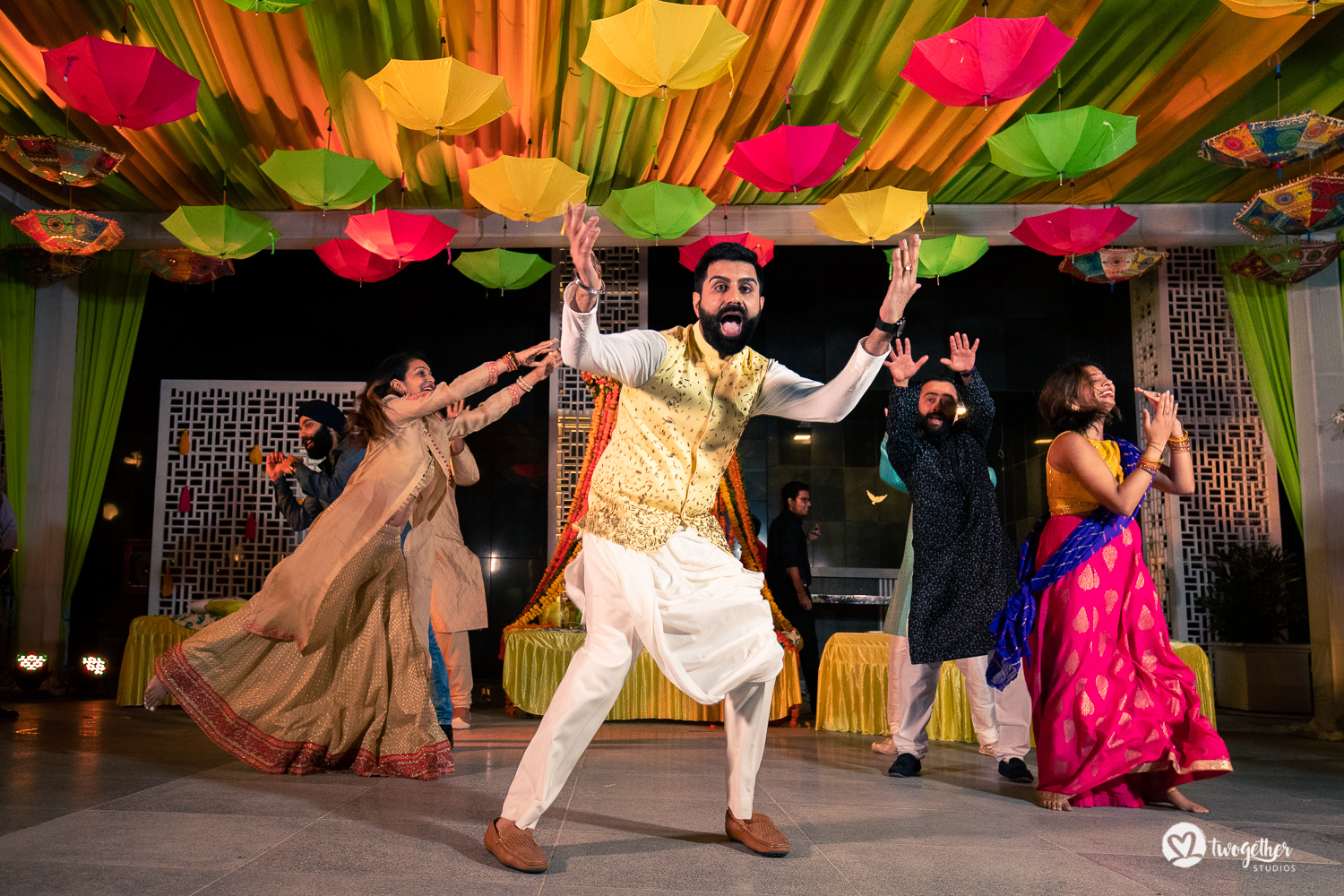 Indian groom dancing at a Delhi wedding.