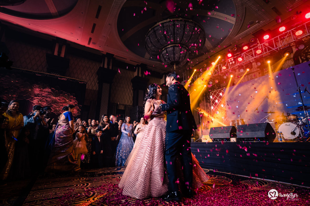 Couple dance in an ITC Grand Bharat wedding.
